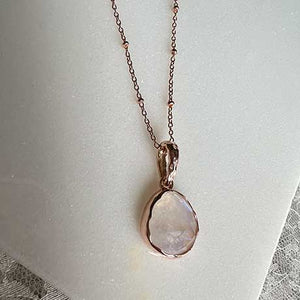 Rose gold necklace with round links and beads