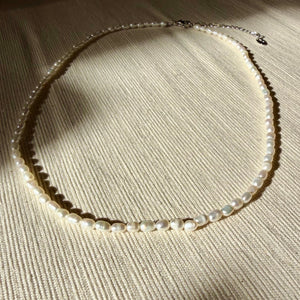 Noor - parelketting goudkleurig edelstaal